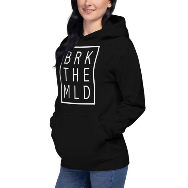 Unisex premium hoodie in black with white rectangle and letters "BRK THE MLD" on a women model