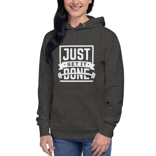 Young woman in charcoal heather premium hoodie with white text "Just get it done" and barbell silhouette