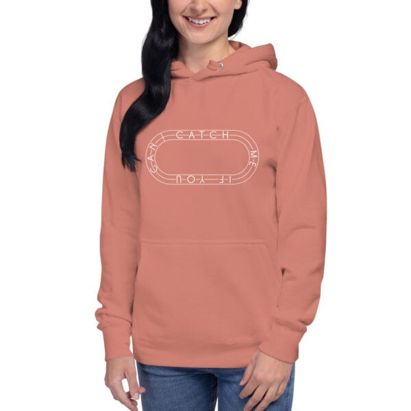 Young woman wearing premium hoodie in dusty rose with white running track with text "Catch me if you can" inside