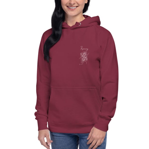 Young woman wearing maroon unisex running queen hoodie, white running playing card on left chest