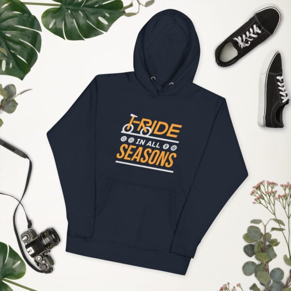 Unisex premium hoodie in navy with text "I ride in all seasons" with I and R making a bike