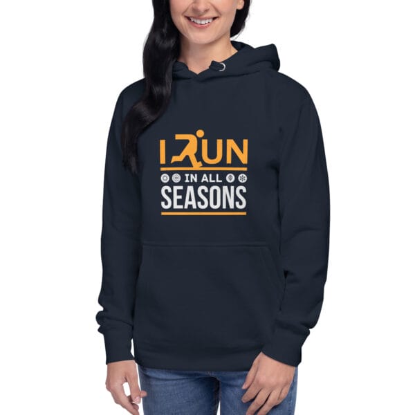 Young woman wearing premium hoodie in navy with text "I run in all seasons" with the letter R a silhouette of a runner