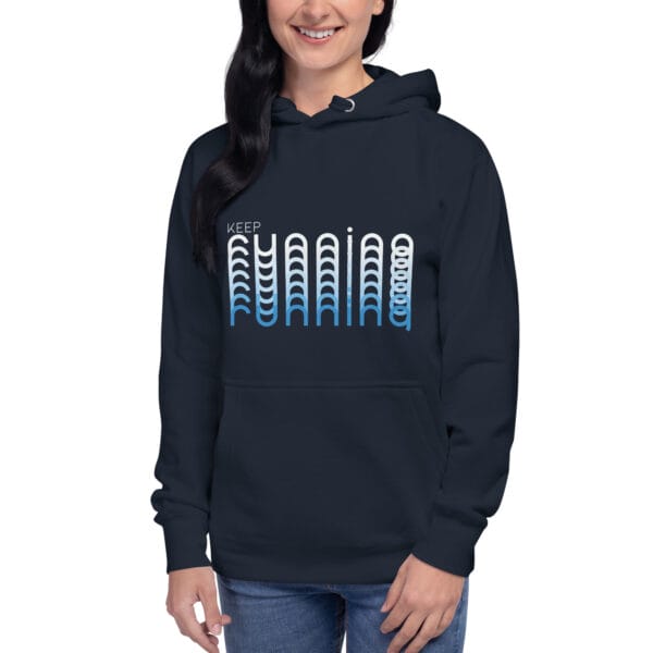 Young woman wearing a navy premium hoodie with text "Keep Running" and running with blend effect of white to blue