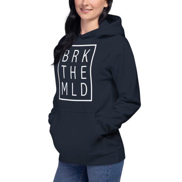 Unisex premium hoodie in navy with white rectangle and letters "BRK THE MLD" on a women model