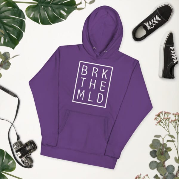 Unisex premium hoodie in purple with white rectangle and letter "BRK THE MLD" meaning 'break the mould'