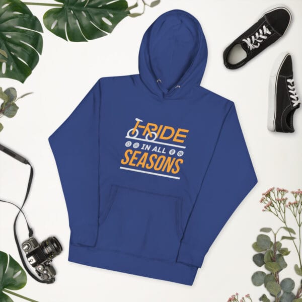 Unisex premium hoodie in royal blue with text "I ride in all seasons" with I and R making a bike