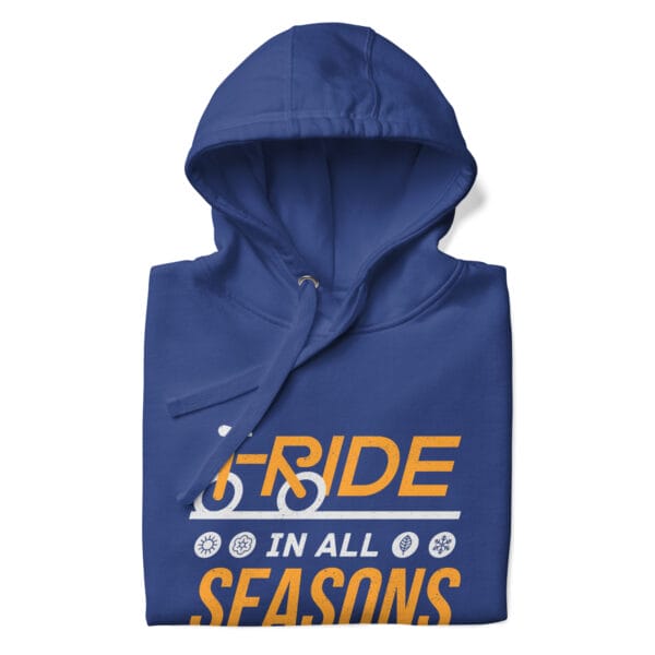 Folded premium hoodie in royal blue with text "I ride in all seasons" and small seasons icons