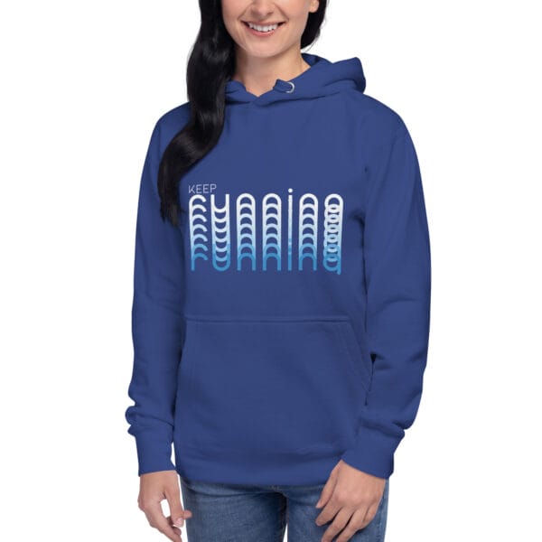 Young woman wearing a royal blue premium hoodie with text "Keep Running" and running with blend effect of white to blue