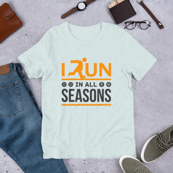 Unisex staple t-shirt in ice blue with text "I run in all seasons" with the letter R a silhouette of a runner