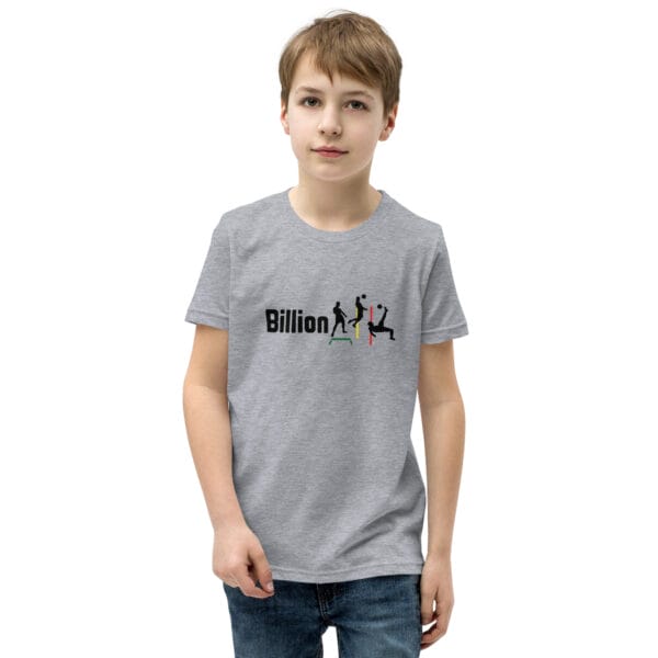 Young white boy wearing athletic heather staple t-shirt with three iconic Cristiano Ronaldo silhouettes and text making 'Billionaire'