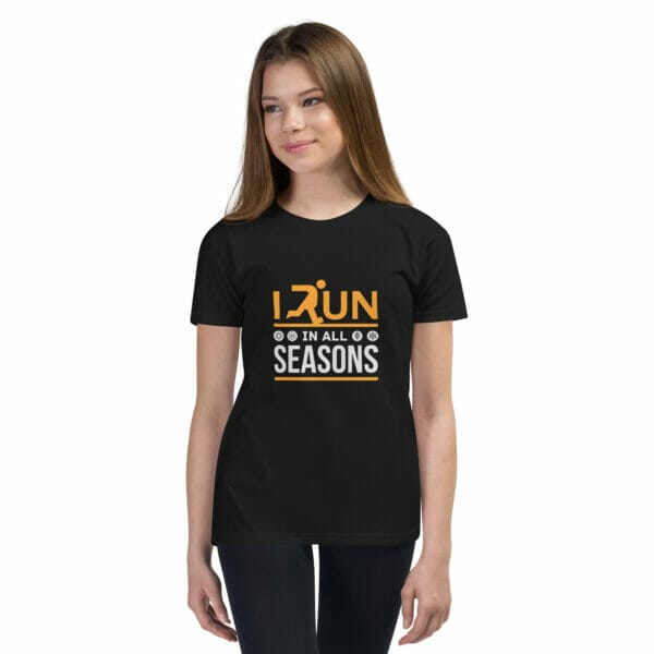 Girl wearing black staple t-shirt with text 'I run in all seasons' and small seasonal icons