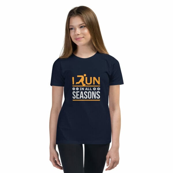 Girl wearing navy staple t-shirt with text 'I run in all seasons' and small seasonal icons