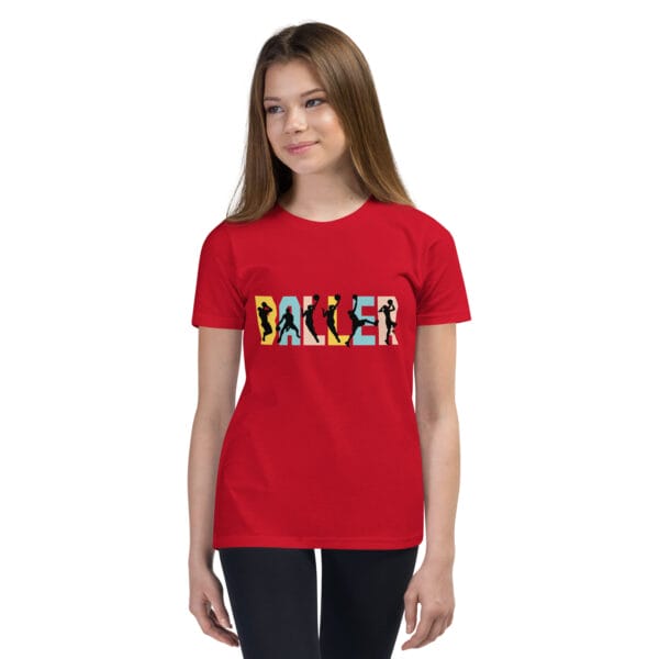 Young girl wearing staple t-shirt in red with the text 'baller' and black basketball player silhouettes in each letter