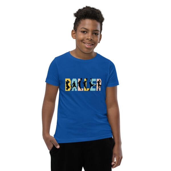 Young boy wearing staple t-shirt in true royal with the text 'baller' and black basketball player silhouettes in each letter