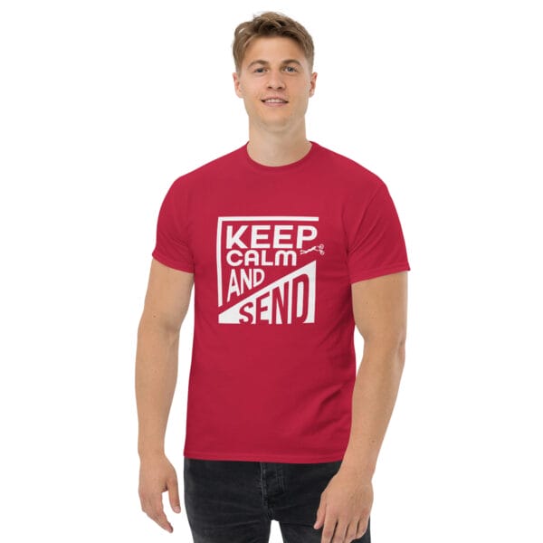 Man wearing a cardinal classic t-shirt with white text 'Keep Calm and Send' with small biker doing a superman air