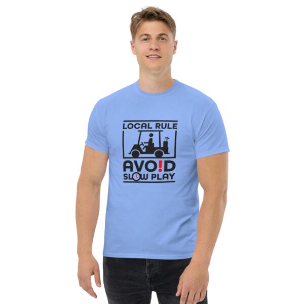 Man wearing carolina blue classic tee in with text 'Local Rule Avoid Slow Play' with golf buggy silhouette