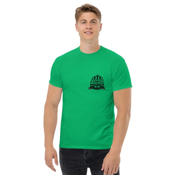 Men's classic tee in Irish green with small black the beautiful game crest on left side of chest