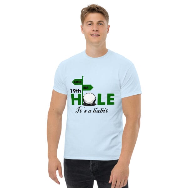 Man wearing classic tee in light blue with text 19th Hole It's a habit with signs pointing to range and bar