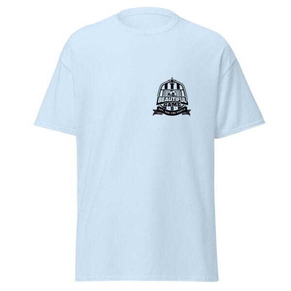 Men's classic tee in light blue with small black the beautiful game crest on left side of chest