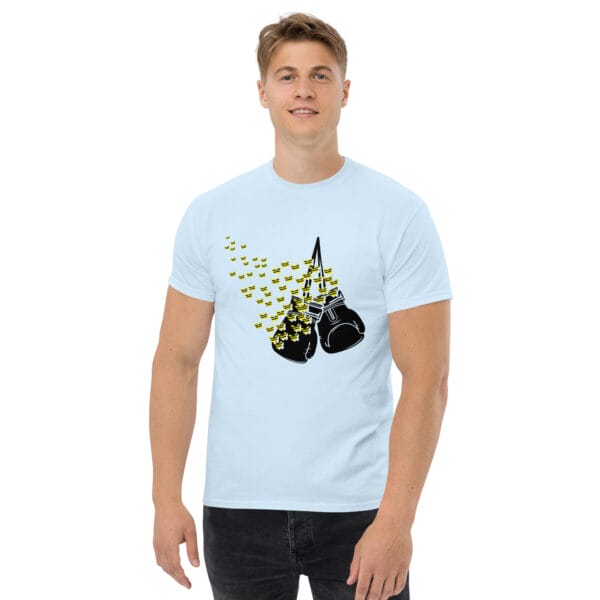 Man wearing light blue classic tee with black boxing gloves hanging and butterflies in yellow and black flying off them