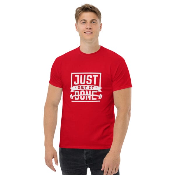 Man wearing a red classic t-shirt with white text 'Just get it done' and a barbell