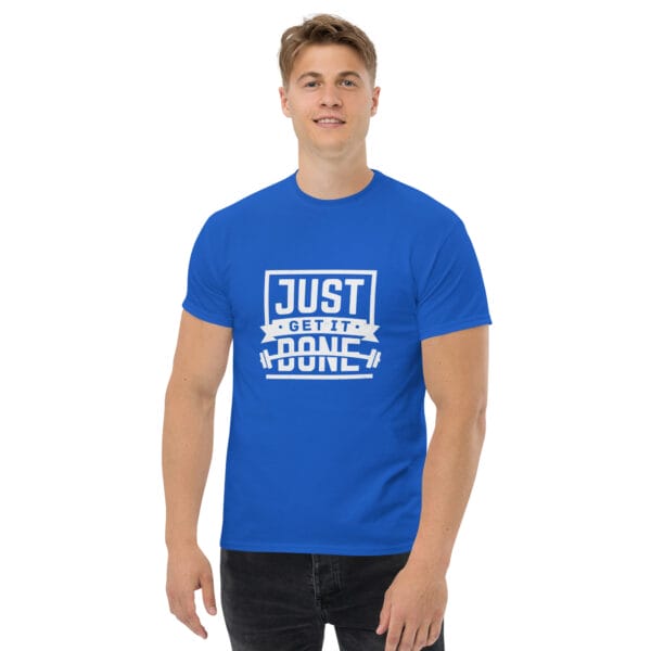 Man wearing a royal blue classic tee with white text 'Just get it done' and a barbell