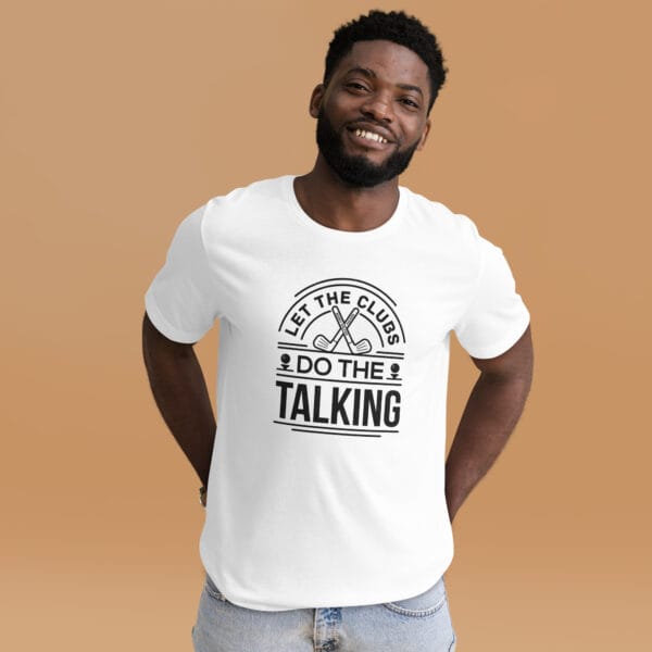 Man wearing unisex staple t-shirt in white with text 'Let the clubs do the talking' and golf clubs and tees