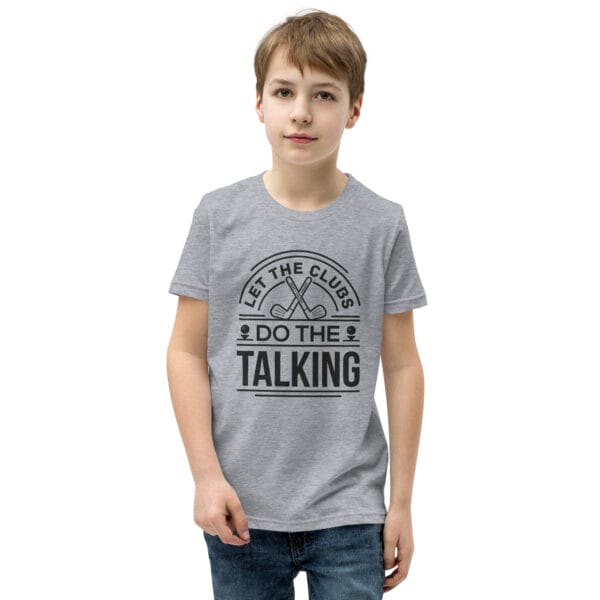 Boy wearing a white staple t-shirt with black text 'Let the clubs do the talking'