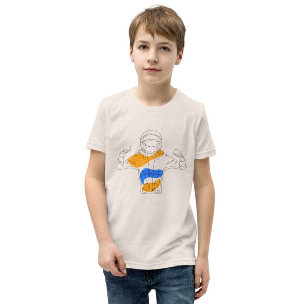 Boy wearing a heather dust staple t-shirt with line drawing of Max Verstappen flexing his arms in race suit and helmet