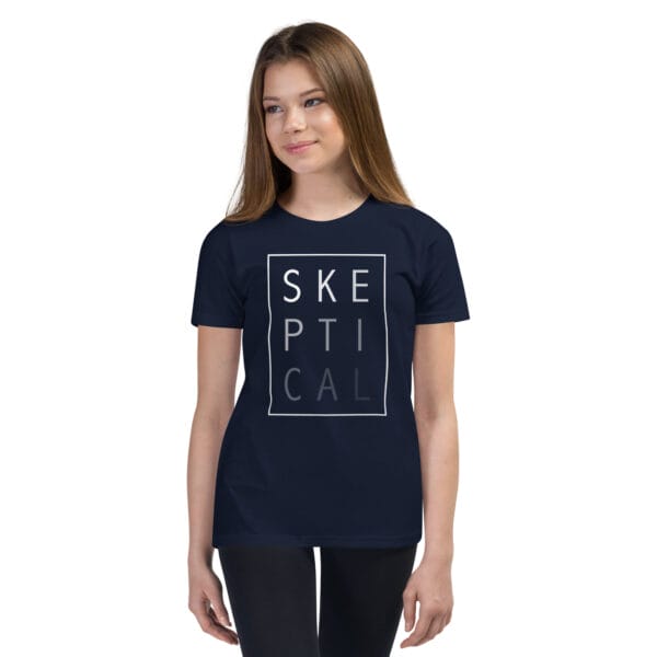 Girl wearing a navy staple t-shirt with white text 'SKEPTICAL' fading out inside a box