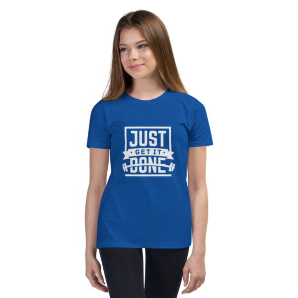 Girl wearing a true royal blue staple tee with large, white text 'Just get it done' and simple graphics