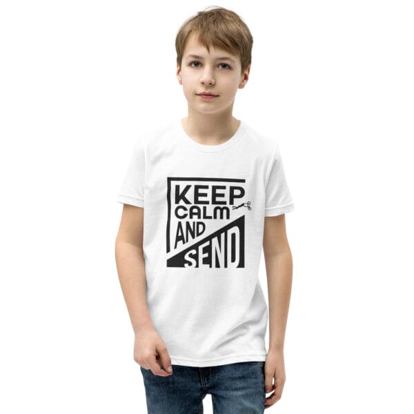 Boy in a white staple tee with black text 'Keep calm and send' and a small biker silhouette doing a superman