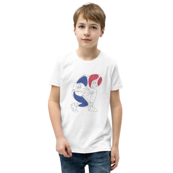 Boy wearing a white staple t-shirt with line drawing of Lewis Hamilton in race suit celebrating