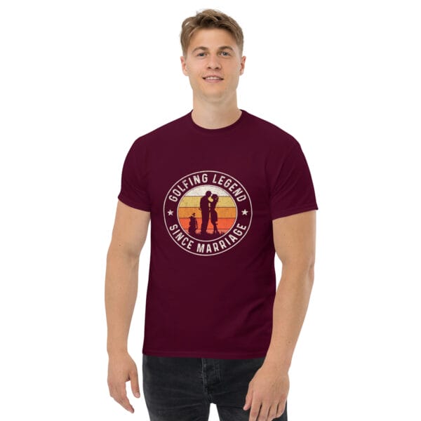 Man wearing a maroon classic tee with white text 'Golfing Legend Since Marriage' forming a circle around image