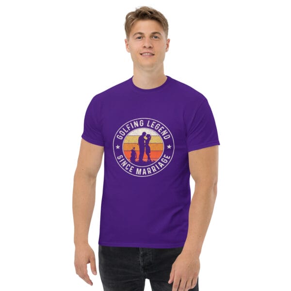 Man wearing a purple classic tee with white text 'Golfing Legend Since Marriage' forming a circle around image