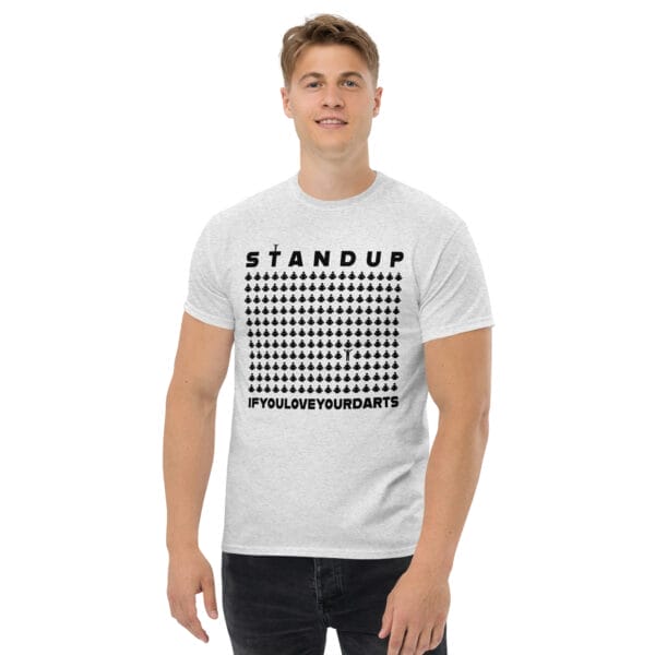 Man wearing classic tee in ash with text 'Stand up if your love your darts' with one icon from many standing