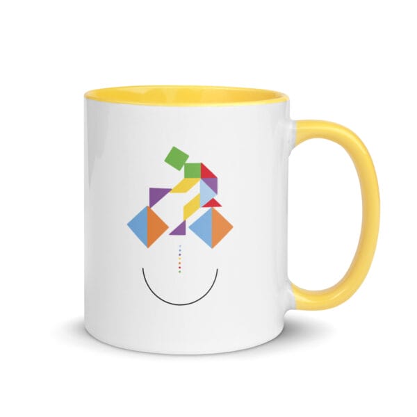 white 11 ounce ceramic mug with yellow colour inside, colourful graphic of cyclist made from tangram puzzle