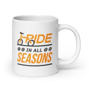 white glossy 20oz mug with seasonal icons and text saying 'I ride in all seasons'