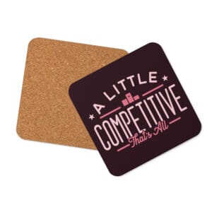 cork-back coaster, dark pink with light pink text 'A little competitive, that's all' with small icons