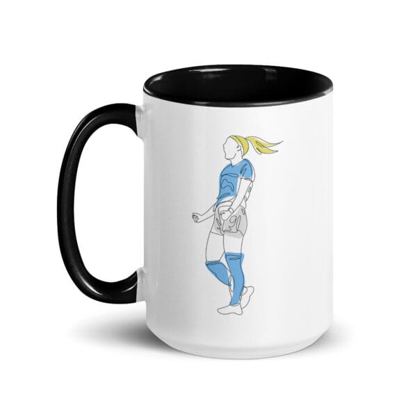 White ceramic 15 ounce mug, black handle and inside, with two line drawings of Chloe Kelly for Manchester City