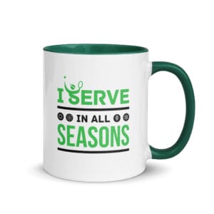 white ceramic 11 ounce tennis mug with dark green handle and colour inside, text outside 'I serve in all seasons' with four seasonal icons