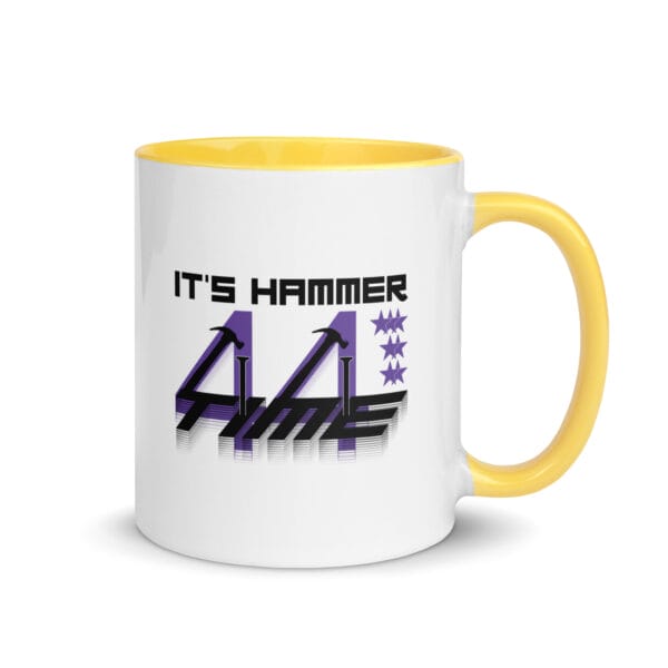 white ceramic 11 ounce mug, with yellow handle and inside, text It's hammer time' with 7 stars, two hammers and number 44