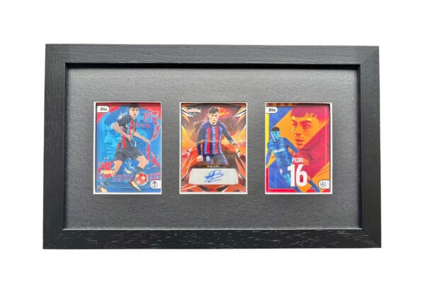 Pedri memorabilia display of three trading cards with one of them signed by Pedri