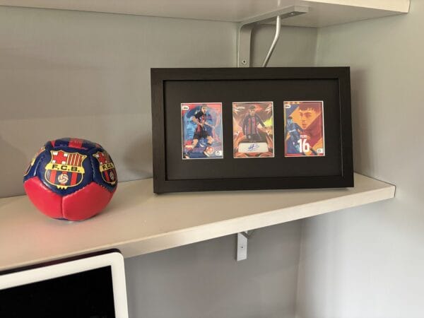 Pedri signed memorabilia 3 card display standing upright on a shelf