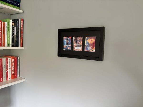 Pedri signed memorabilia display hanging on the wall