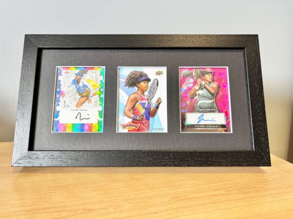Naomi Osaka memorabilia black display case sitting on bedside table using optional leg stand, Osaka two autographs