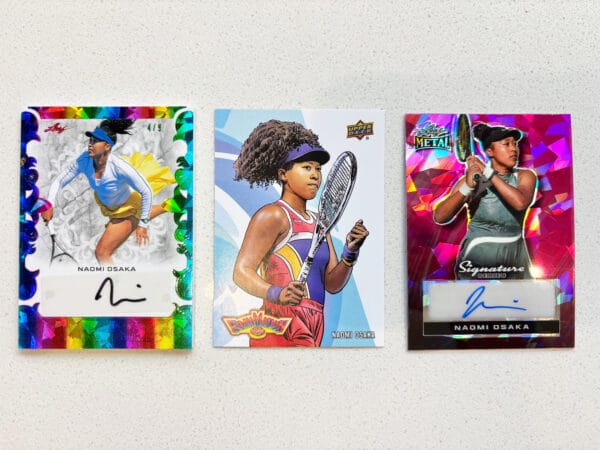 Osaka three sports trading cards from the front, showing two Osaka autographs