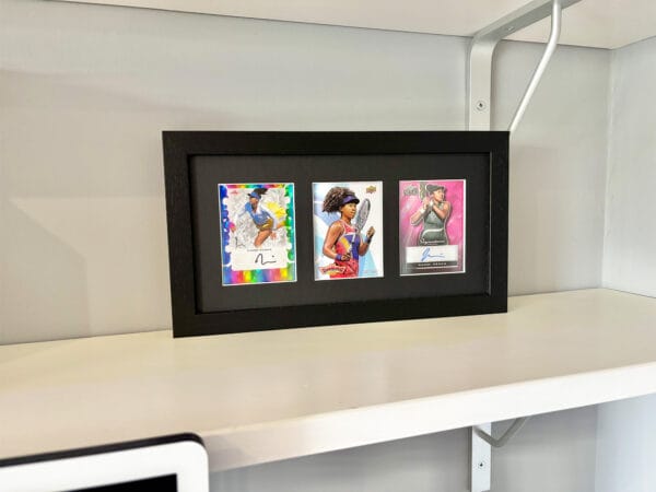 Naomi Osaka autograph memorabilia black display standing upright on shelf