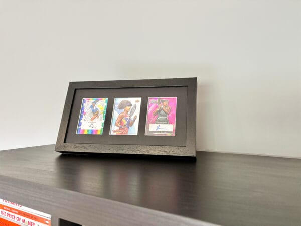 Naomi Osaka autograph memorabilia black display case on surface using optional leg stand