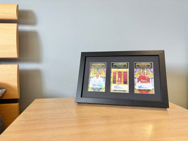 Michael Owen memorabilia display case on bedside table, three autographs from Owen, including rare 1 of 1